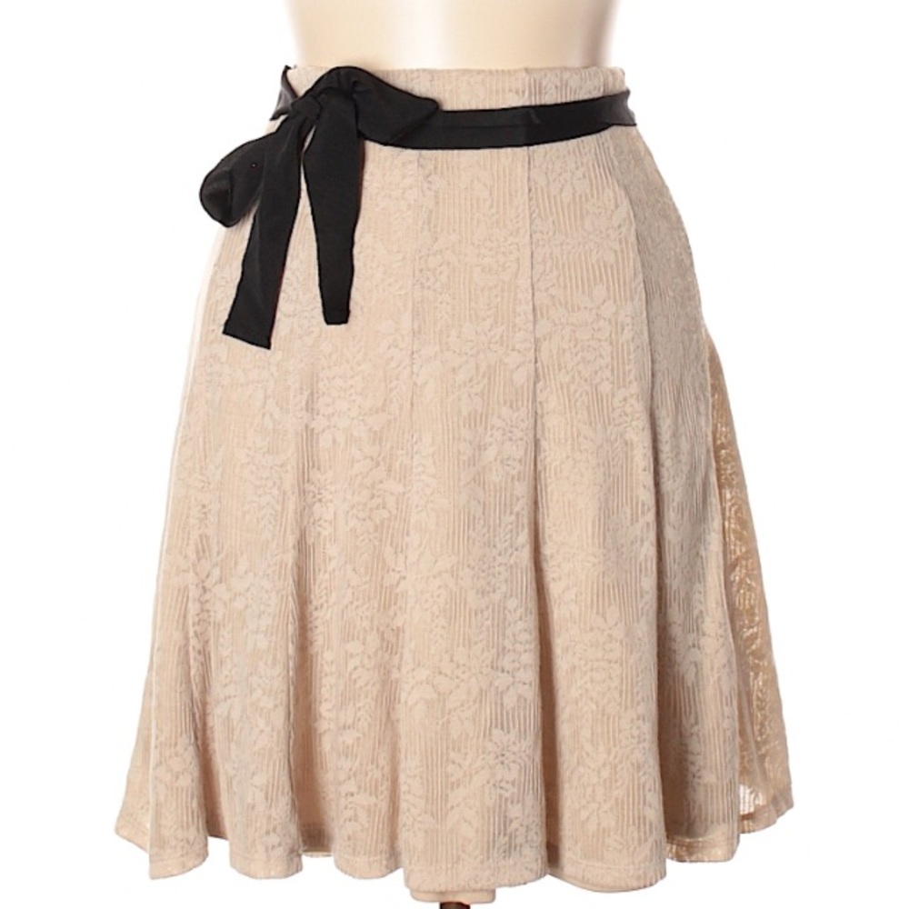 Maurice’s knee length tan skirt